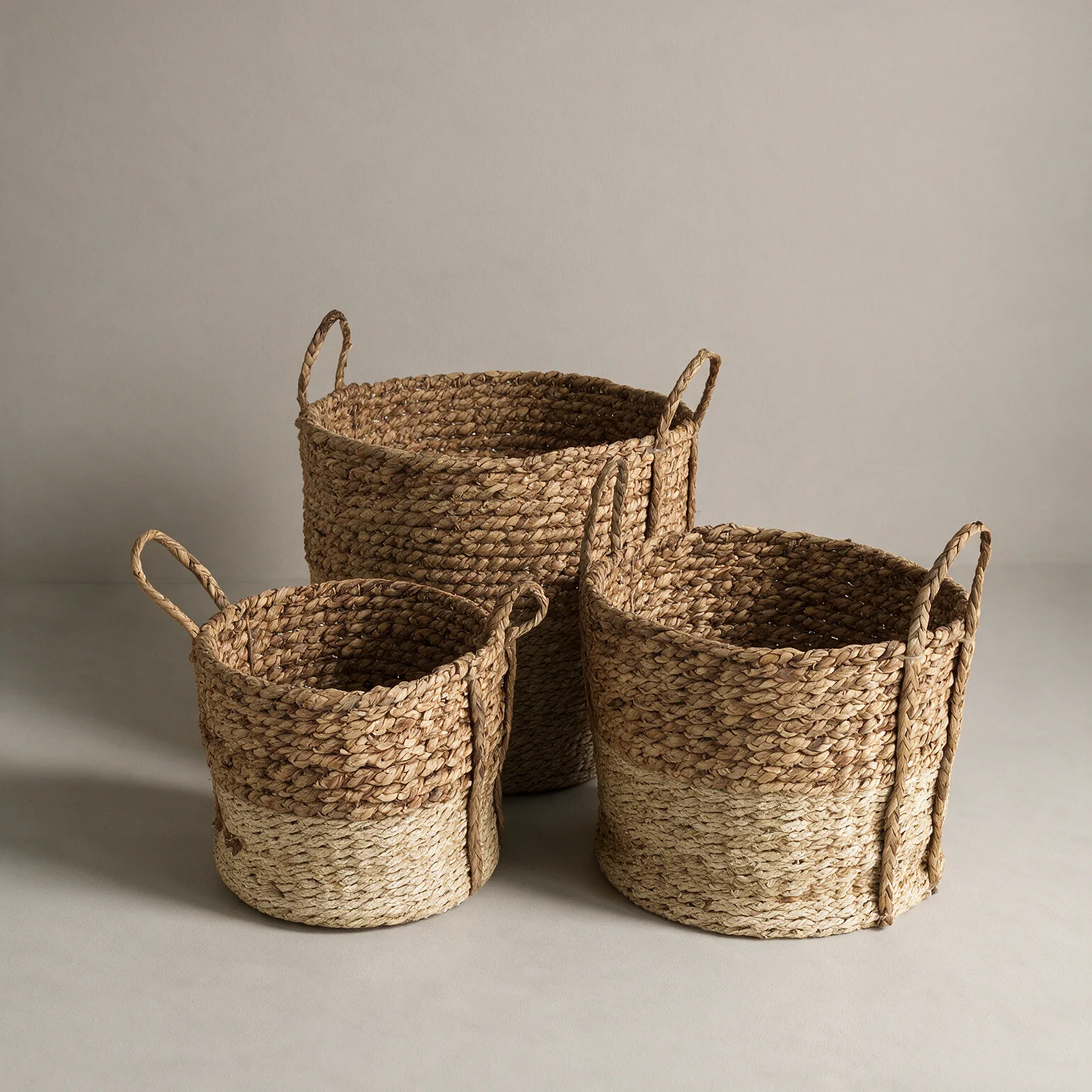 Set of Three Brown Wicker Basket, three-quarter view