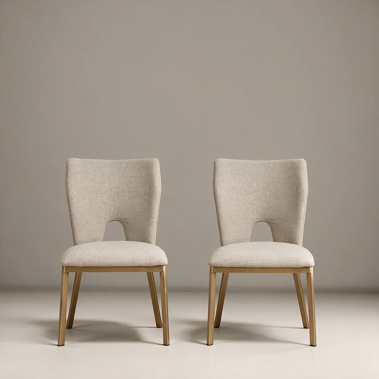Set of Two Beige And Brass Upholstered Fabric Open Back Dining Side Chairs, front view