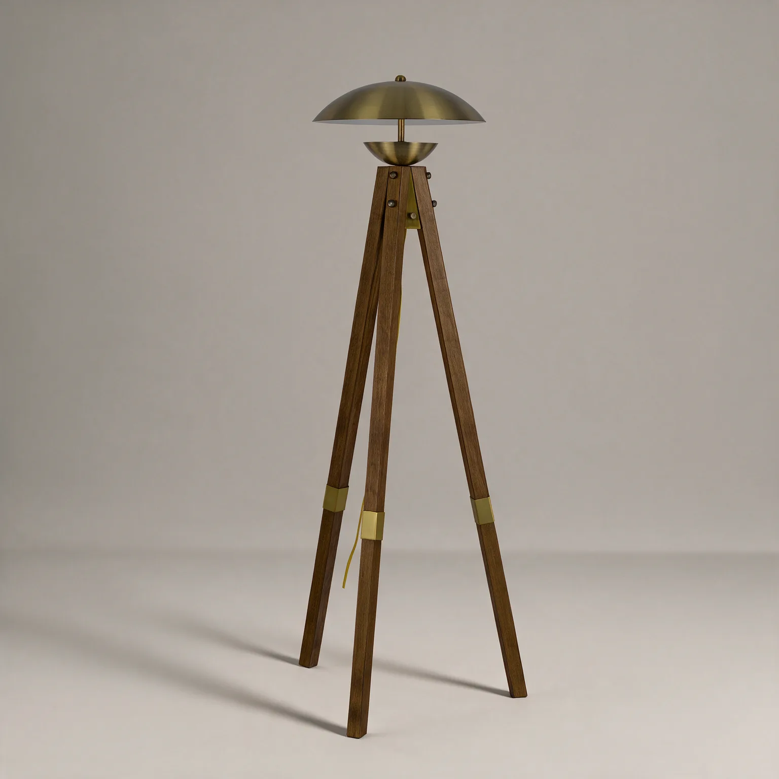 55" Brass Tripod Floor Lamp With Antiqued Brass Dome Shade, three-quarter view