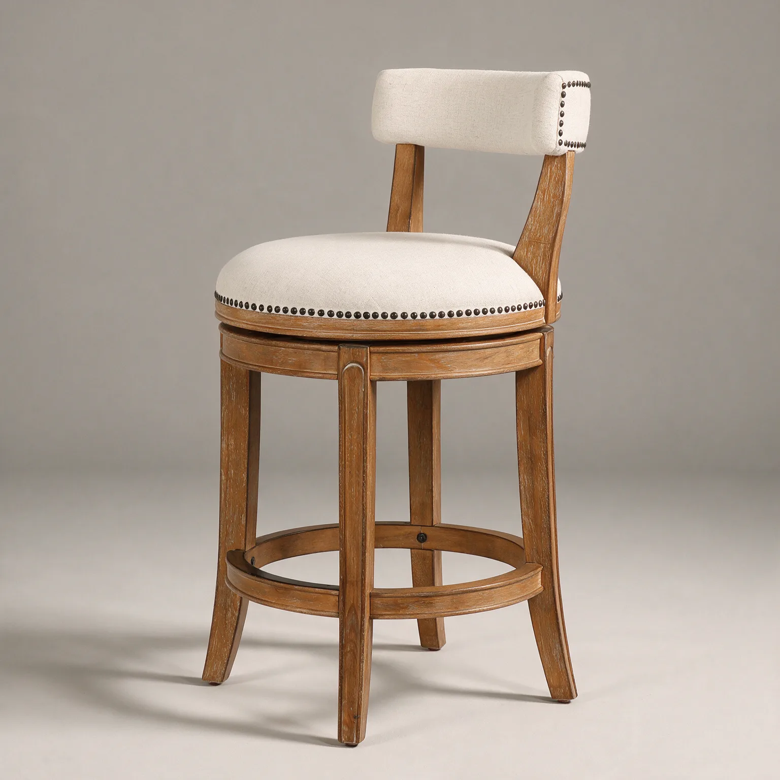 26" Linen And Brown Fabric And Solid Wood Low Back Counter Height Swivel Bar Chair, three-quarter view